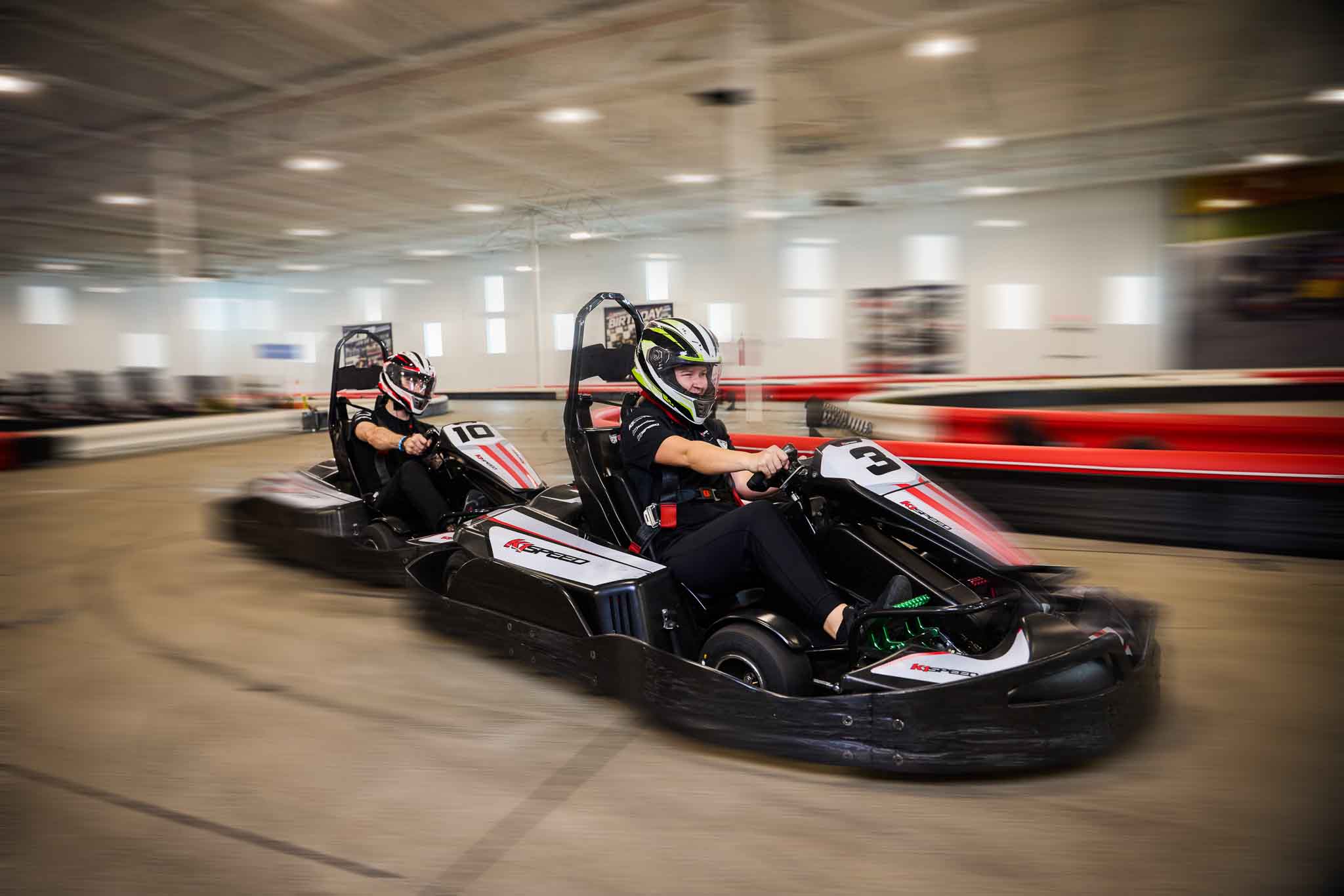 image of two indoor go karts on a track